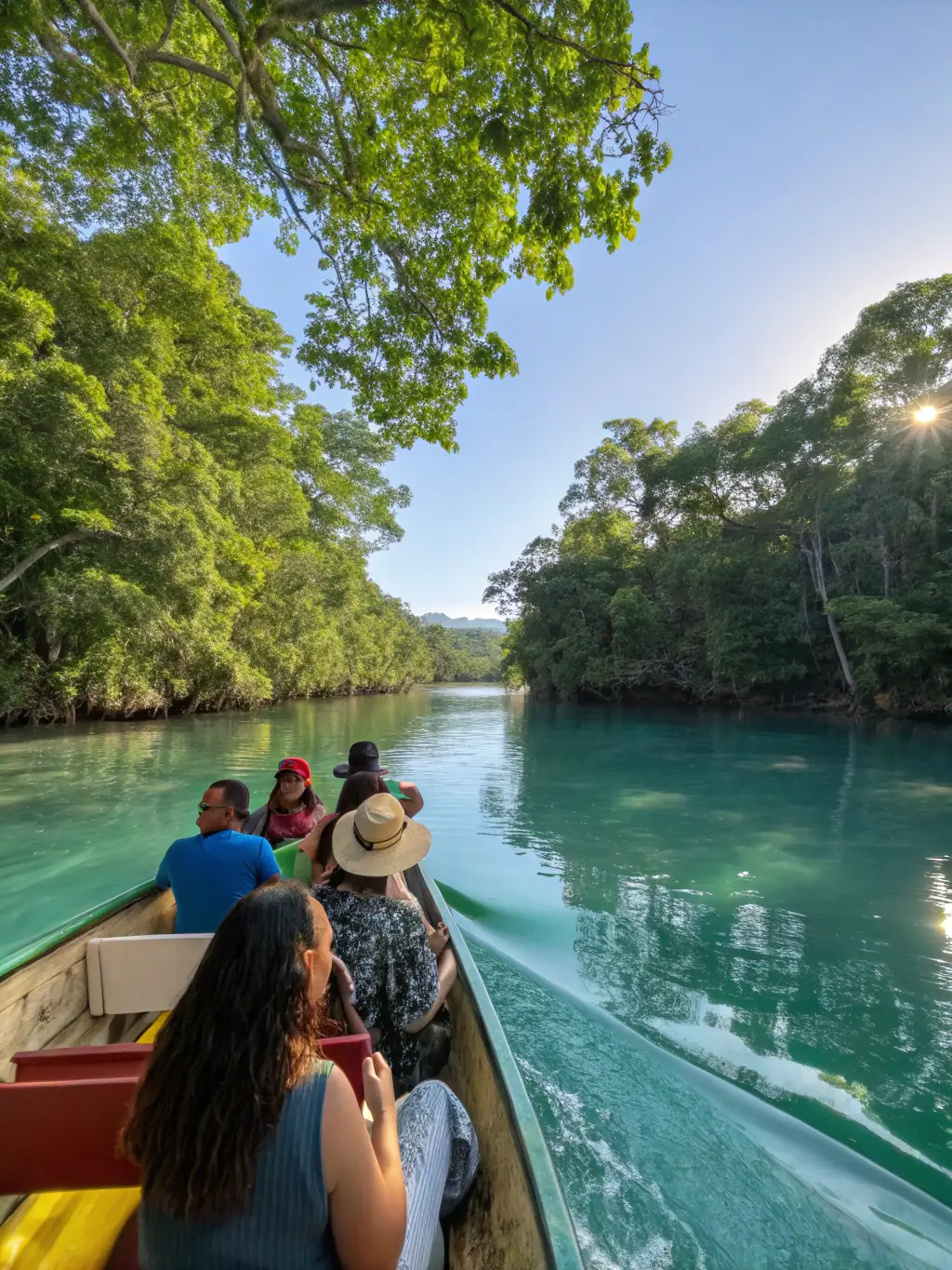 A dynamic image of tourists river rafting down a Jamaican river, surrounded by lush greenery and enjoying the thrill of the rapids.